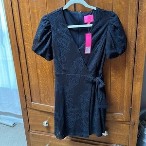 Black Lilly Pulitzer Jasleen wrap romper, size small